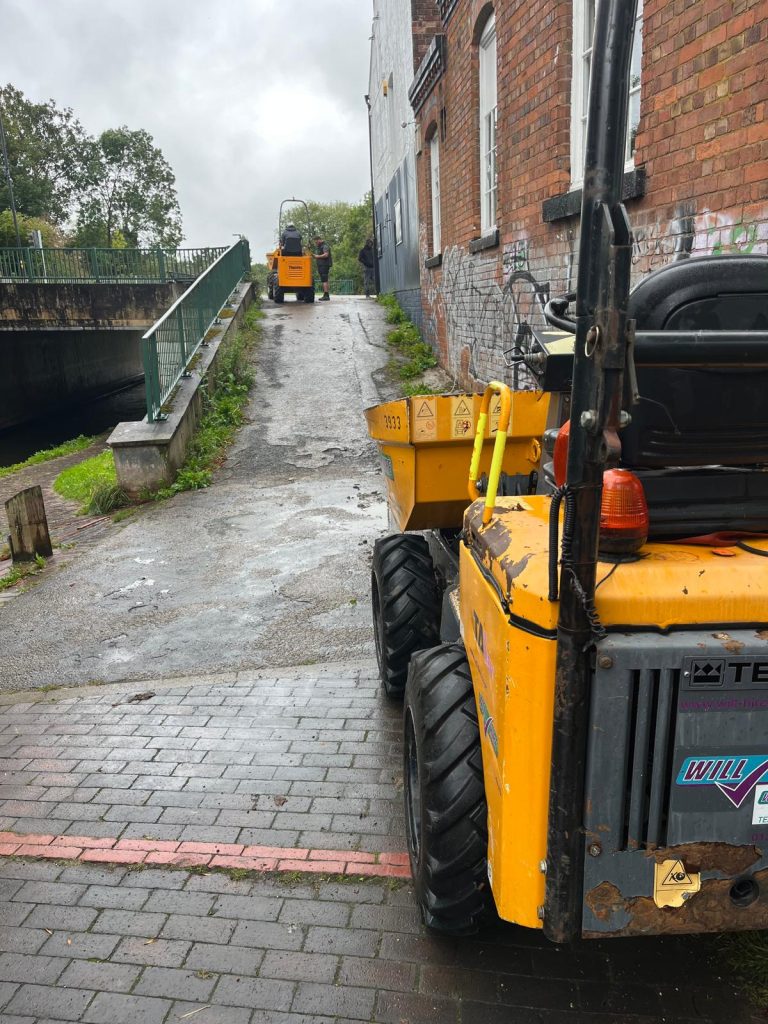 Canal single story rear extension for 1800s cottage, overcoming logistical issues with property access, miners cottage large rear extension. walk on roof